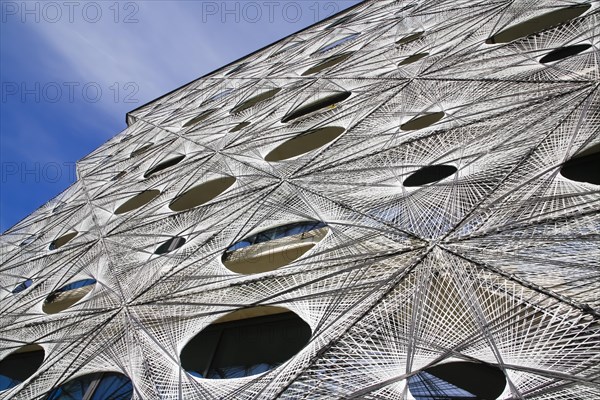 Reutlingen University, Reutlingen University, Texoversum, German University Building Award 2024 for TEXOVERSUM, modern architecture, facade made of carbon and glass fibres, mesh, innovative, identity-creating, unique facade, campus, place of learning, special, extraordinary new building for textile courses, light, airy, airy, holes, detail, architectural eye-catcher, Reutlingen, Baden-Wuerttemberg, Germany, Europe