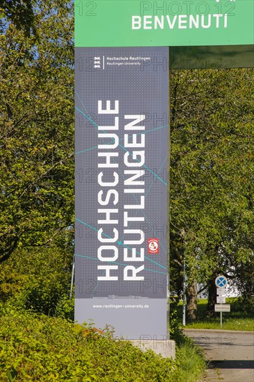 Detail entrance portal of Reutlingen University, Reutlingen University, large representative gate, gate, entrance, to the university campus, welcome words, writing, letters, benvenuti, different languages, Texoversum, campus, place of learning, Reutlingen, Baden-Wuerttemberg, Germany, Europe