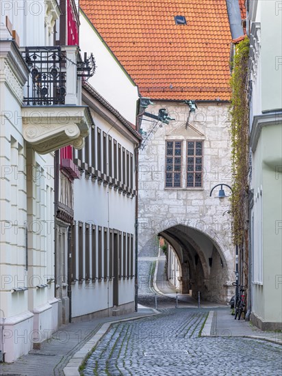 Archway at the town hall in the historic old town, alley with cobblestones, Muehlhausen, Thuringia, Germany, Europe