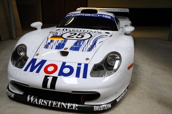 Deutsches Automuseum Langenburg, A white Porsche racing car with sponsor logos on display in a car museum, Deutsches Automuseum Langenburg, Langenburg, Baden-Wuerttemberg, Germany, Europe