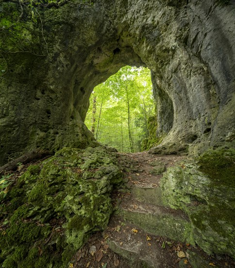 Hiking trail leads through a rock gate, Goessweinstein, Franconian Switzerland, Upper Franconia, Franconia, Bavaria, Germany, Europe