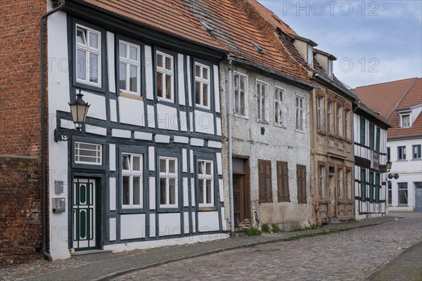 Partly dilapidated houses in Muehlenstrasse, Havelberg, Saxony-Anhalt, Germany, Europe