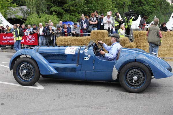 A driver in a blue vintage racing car takes part in a retro event, SOLITUDE REVIVAL 2011, Stuttgart, Baden-Wuerttemberg, Germany, Europe