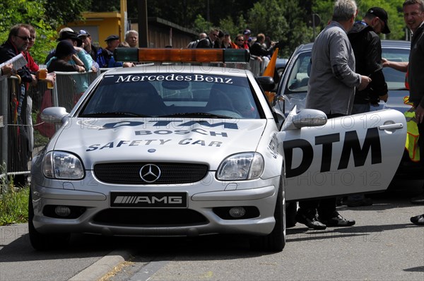 A Mercedes-Benz AMG Safety Car stands on a race track in front of spectators, SOLITUDE REVIVAL 2011, Stuttgart, Baden-Wuerttemberg, Germany, Europe