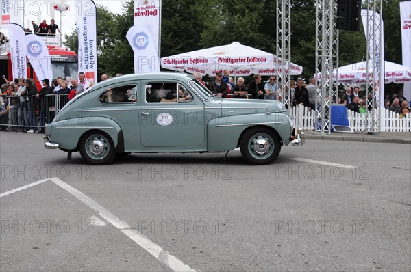 A vintage car drives on a road, watched by spectators, SOLITUDE REVIVAL 2011, Stuttgart, Baden-Wuerttemberg, Germany, Europe