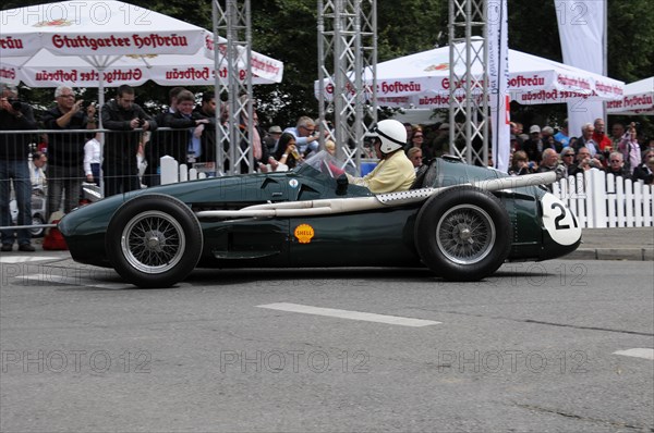 A green vintage racing car with the number 20 drives past spectators, SOLITUDE REVIVAL 2011, Stuttgart, Baden-Wuerttemberg, Germany, Europe