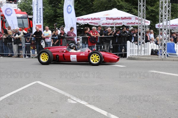 Red racing car with the number 210 drives past enthusiastic fans, SOLITUDE REVIVAL 2011, Stuttgart, Baden-Wuerttemberg, Germany, Europe