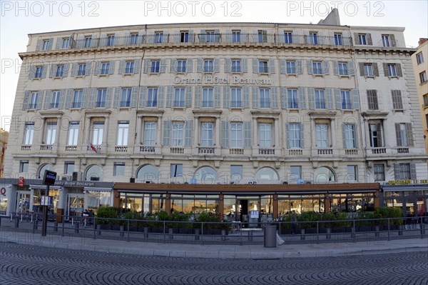 View of the Grand Hotel Beauvau with cafe in the foreground, Marseille, Departement Bouches-du-Rhone, Region Provence-Alpes-Cote d'Azur, France, Europe