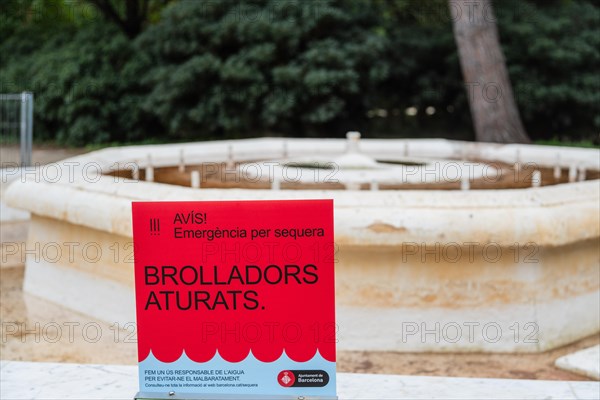 Signpost showing wells switched off due to water shortage in Barcelona, Spain, Europe