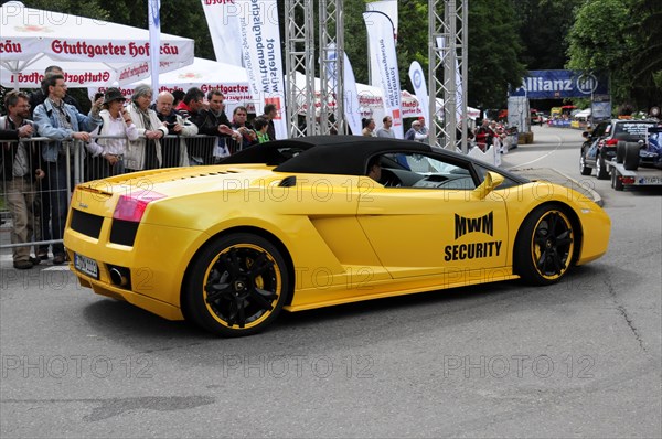 Side view of a yellow Lamborghini sports car with sponsor stickers at a race, SOLITUDE REVIVAL 2011, Stuttgart, Baden-Wuerttemberg, Germany, Europe