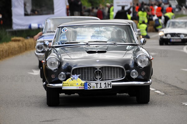 A classic blue Lancia drives on the road in a classic car race, SOLITUDE REVIVAL 2011, Stuttgart, Baden-Wuerttemberg, Germany, Europe