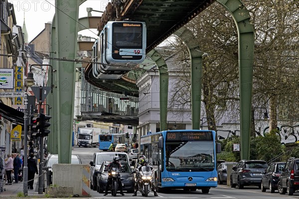 Transport with suspension railway, bus, cars and motorbikes in Vohwinkel, Wuppertal, Bergisches Land, North Rhine-Westphalia, Germany, Europe
