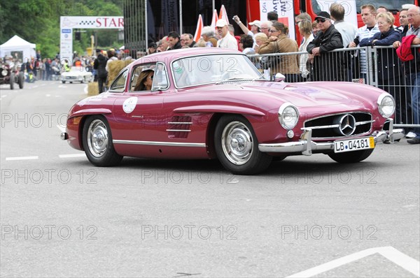 Red Mercedes vintage coupe at a racing event with an audience, SOLITUDE REVIVAL 2011, Stuttgart, Baden-Wuerttemberg, Germany, Europe