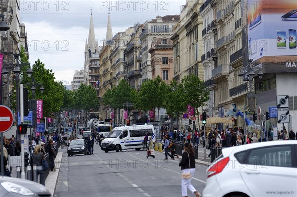 Marseille, View of a busy city street with passers-by and traffic, Marseille, Departement Bouches-du-Rhone, Region Provence-Alpes-Cote d'Azur, France, Europe