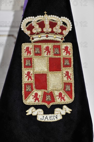 Castillo de Santa Catalina on Jaen, Detailed embroidery of a coat of arms with golden decoration on a velvety fabric, Granada, Andalusia, Spain, Europe