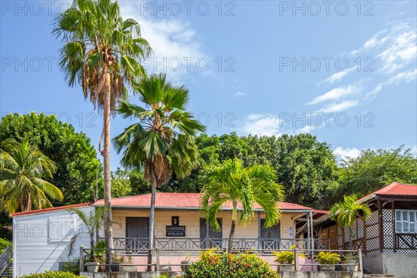 Deshaies, historic Caribbean wooden building of a street in Guadeloupe, Caribbean, French Antilles