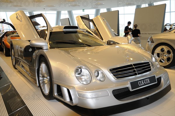 Museum, Mercedes-Benz Museum, Stuttgart, A silver Mercedes-Benz CLK GTR with open gullwing doors in an exhibition, Mercedes-Benz Museum, Stuttgart, Baden-Wuerttemberg, Germany, Europe