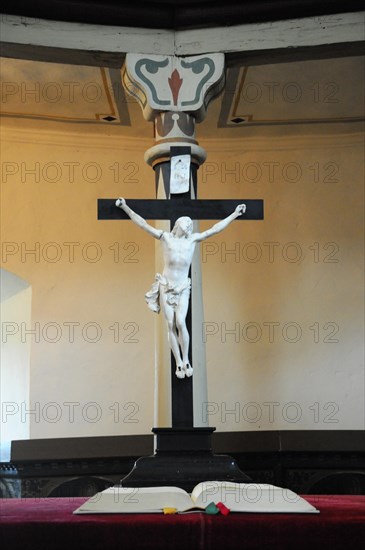 Langenburg Castle, A cross with a figure of Jesus above an altar in a church devotional setting, Langenburg Castle, Langenburg, Baden-Wuerttemberg, Germany, Europe