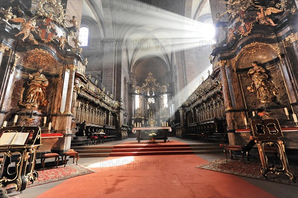 Speyer Cathedral, rays of light fall on the red carpet in a church with baroque sculptures, Speyer Cathedral, Unesco World Heritage Site, foundation stone laid around 1030, Speyer, Rhineland-Palatinate, Germany, Europe