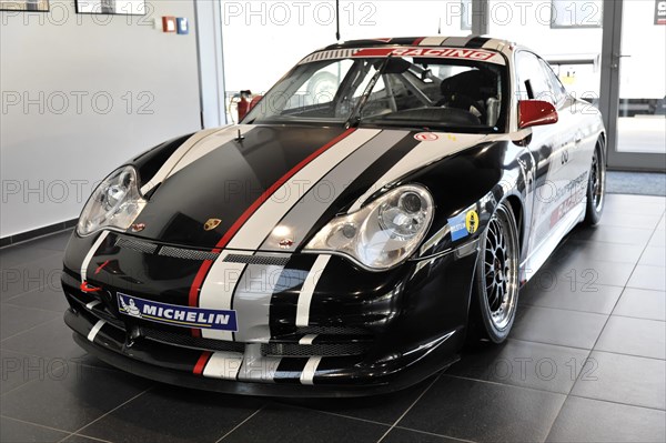 A Porsche 911 racing car with advertising livery and Michelin sponsorship, Schwaebisch Gmuend, Baden-Wuerttemberg, Germany, Europe