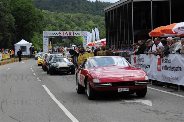 A green vintage sports car stands in front of the starting line of a road race, SOLITUDE REVIVAL 2011, Stuttgart, Baden-Wuerttemberg, Germany, Europe