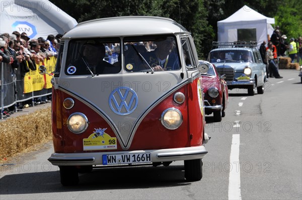 A classic VW T1 bus drives past a crowd of people, SOLITUDE REVIVAL 2011, Stuttgart, Baden-Wuerttemberg, Germany, Europe