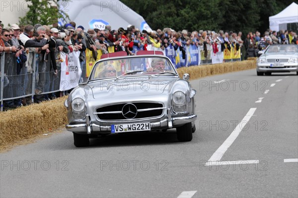 A silver Mercedes-Benz convertible classic car enjoys the attention at a rally, SOLITUDE REVIVAL 2011, Stuttgart, Baden-Wuerttemberg, Germany, Europe