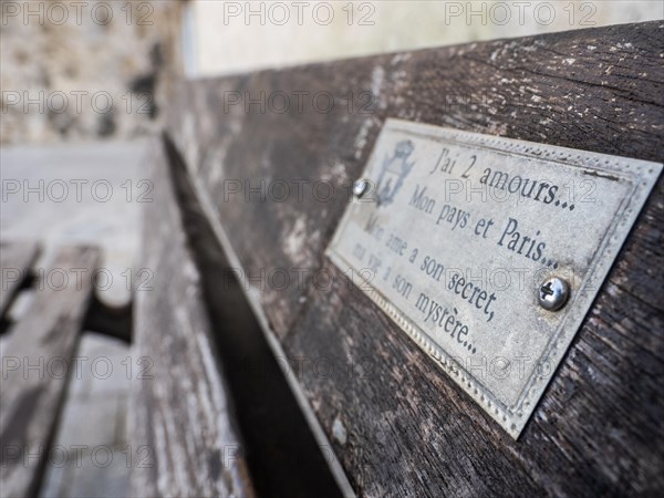 Sign on a bench, Alghero, Sardinia, Italy, Europe