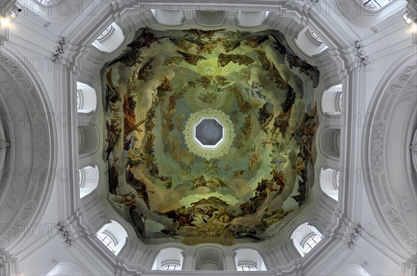 The dome in the Neumuenster collegiate monastery, Wuerzburg, view of an elaborately painted dome ceiling in Baroque style with dynamic lighting effects, Wuerzburg, Lower Franconia, Bavaria, Germany, Europe