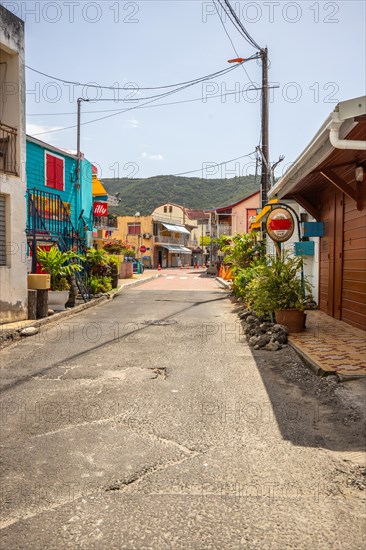 Deshaies, historic Caribbean wooden building of a street in Guadeloupe, Caribbean, French Antilles