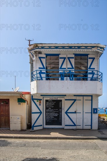 Deshaies, historic Caribbean wooden building of a street in Guadeloupe, Caribbean, French Antilles