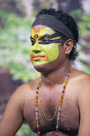 Kathakali performer or mime, 38 years old, with painted face, Kochi Kathakali Centre, Kochi, Kerala, India, Asia