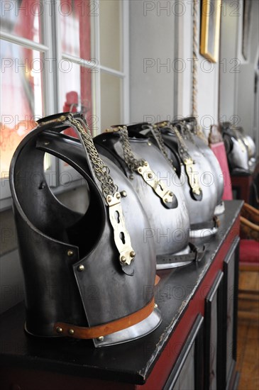 Langenburg Castle, row of decorated metal armour displayed on a windowsill, Langenburg Castle, Langenburg, Baden-Wuerttemberg, Germany, Europe