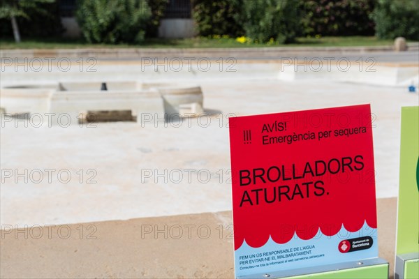 Signpost showing wells switched off due to water shortage in Barcelona, Spain, Europe