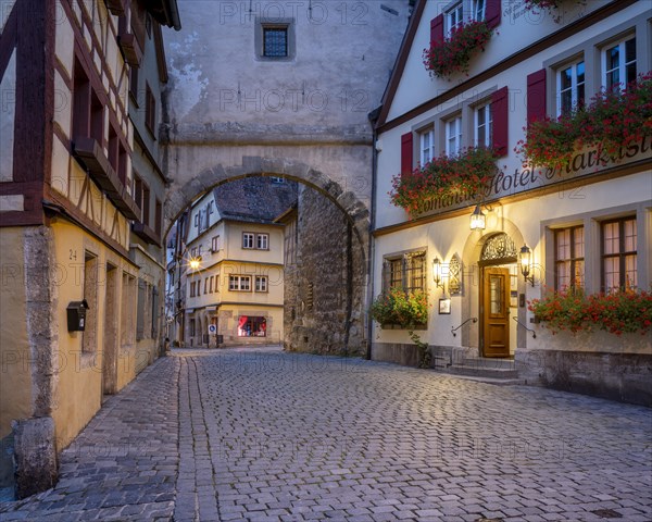 Roedergasse with Roederbogen at dawn, Rothenburg ob der Tauber, Middle Franconia, Bavaria, Germany, Europe