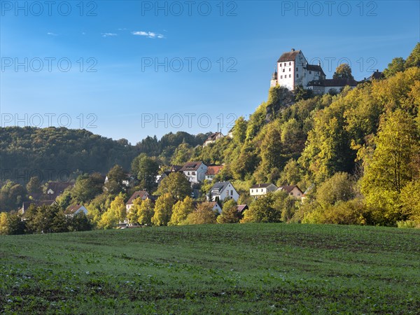 Egloffstein castle and village in the Trubach valley in autumn, Egloffstein, Upper Franconia, Franconian Switzerland, Bavaria, Germany, Europe