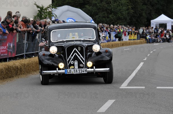 A classic black Citroen drives in front of spectators at a classic car race, SOLITUDE REVIVAL 2011, Stuttgart, Baden-Wuerttemberg, Germany, Europe