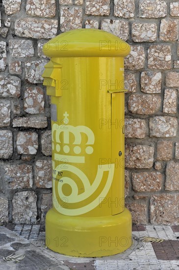 Solabrena, light yellow Spanish letterbox with symbols of the Spanish postal service, Andalusia, Spain, Europe