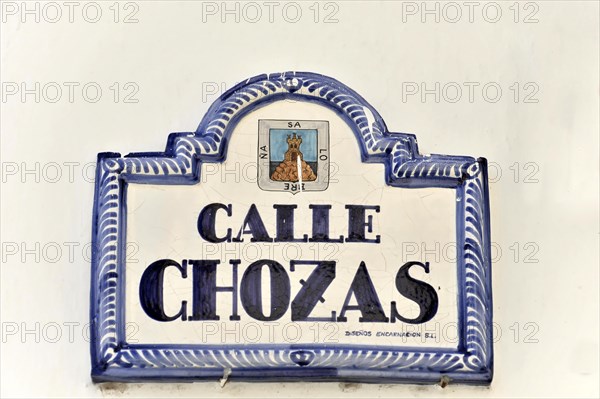 Solabrena, A traditional blue and white ceramic sign shows the street name 'Calle Chozas', Andalusia, Spain, Europe