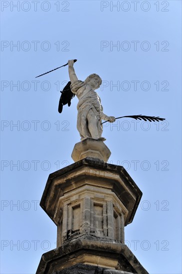 Granada, Statue with sword and wings on a column in front of a clear sky, Granada, Andalusia, Spain, Europe