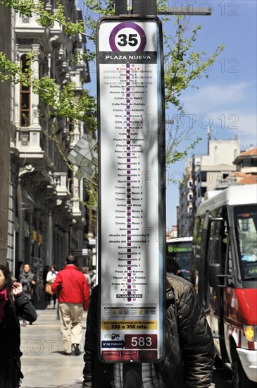 Granada, bus stop sign with the number 35 and a list of bus stops in an urban context, Granada, Andalusia, Spain, Europe