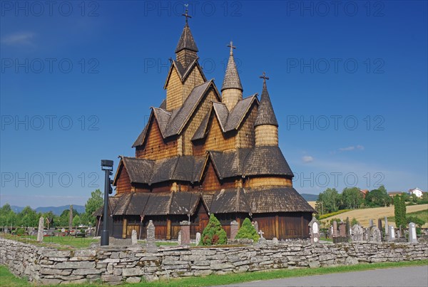 Heddal Stave Church in a green landscape, Notodden, Telemark, Norway, Europe