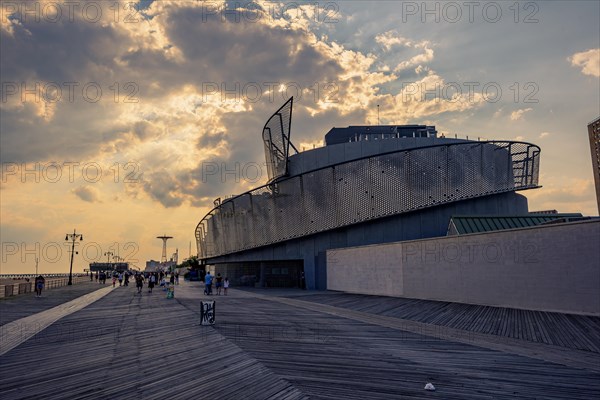 Sun sets on a warm summer day in Coney Island, Brooklyn, NY, USA, USA, North America