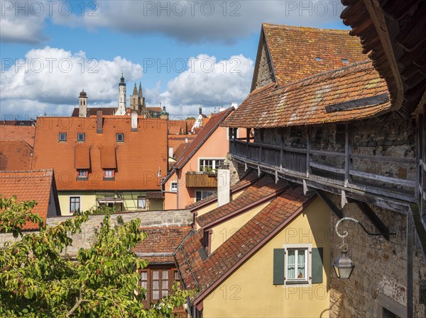 View from the battlements of the town wall to the houses and towers of the historic old town, Rothenburg ob der Tauber, Middle Franconia, Bavaria, Germany, Europe