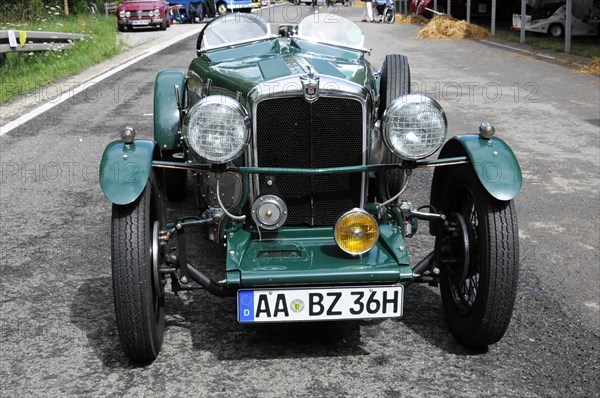 Morris 8, A detailed green vintage car with yellow headlights, SOLITUDE REVIVAL 2011, Stuttgart, Baden-Wuerttemberg, Germany, Europe