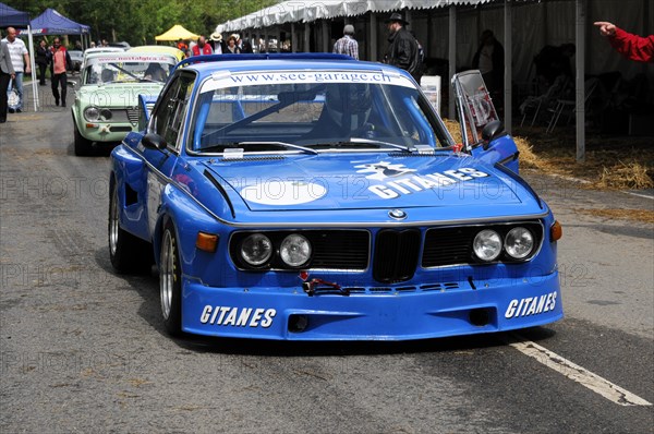 A blue BMW racing car with advertising lettering parked on a street, SOLITUDE REVIVAL 2011, Stuttgart, Baden-Wuerttemberg, Germany, Europe