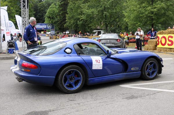 A blue sports car with racing number at a classic car race surrounded by spectators, SOLITUDE REVIVAL 2011, Stuttgart, Baden-Wuerttemberg, Germany, Europe