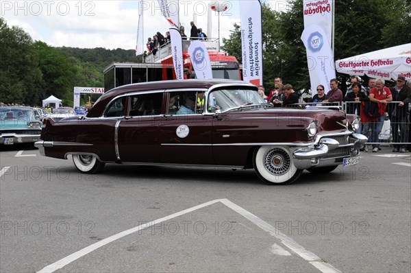Burgundy red Cadillac classic car drives past a crowd at an event, SOLITUDE REVIVAL 2011, Stuttgart, Baden-Wuerttemberg, Germany, Europe