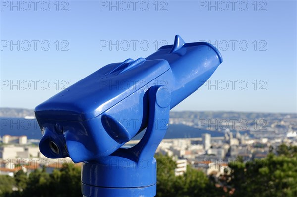 Blue telescope overlooking the city from a high vantage point, Marseille, Departement Bouches-du-Rhone, Provence-Alpes-Cote d'Azur region, France, Europe