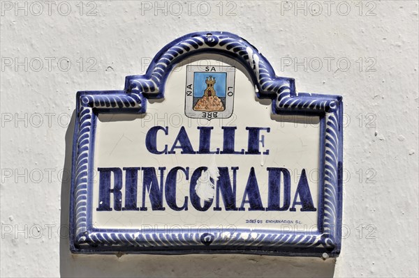 Solabrena, A blue and white ceramic road sign with the inscription 'CALLE RINCONADA', Costa del Sol, Andalusia, Spain, Europe